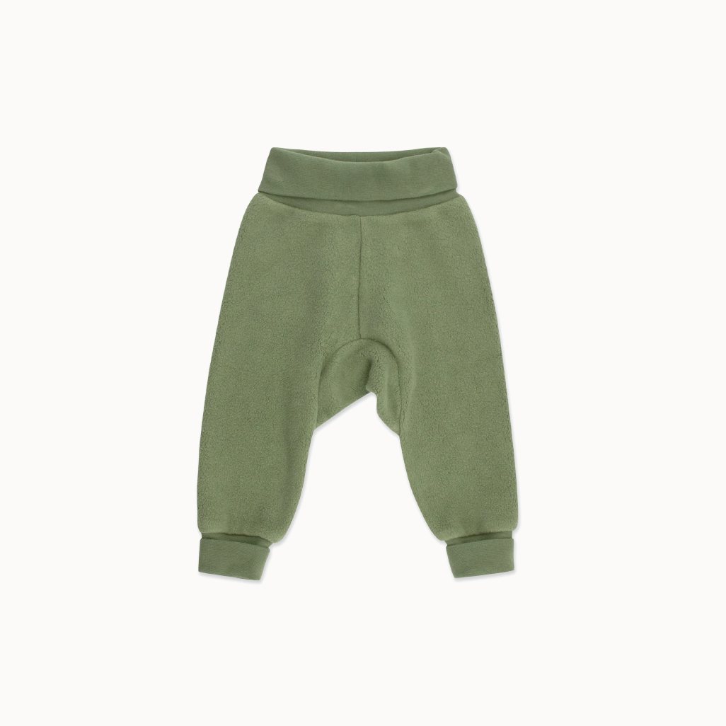 Green baby pants on a white background