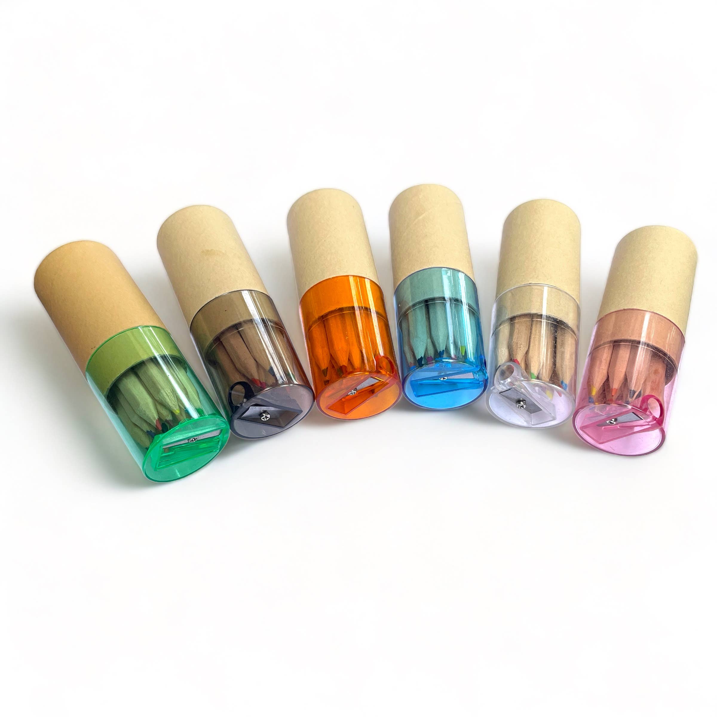 Set of six colorful lip balm tubes with wooden caps on a white background