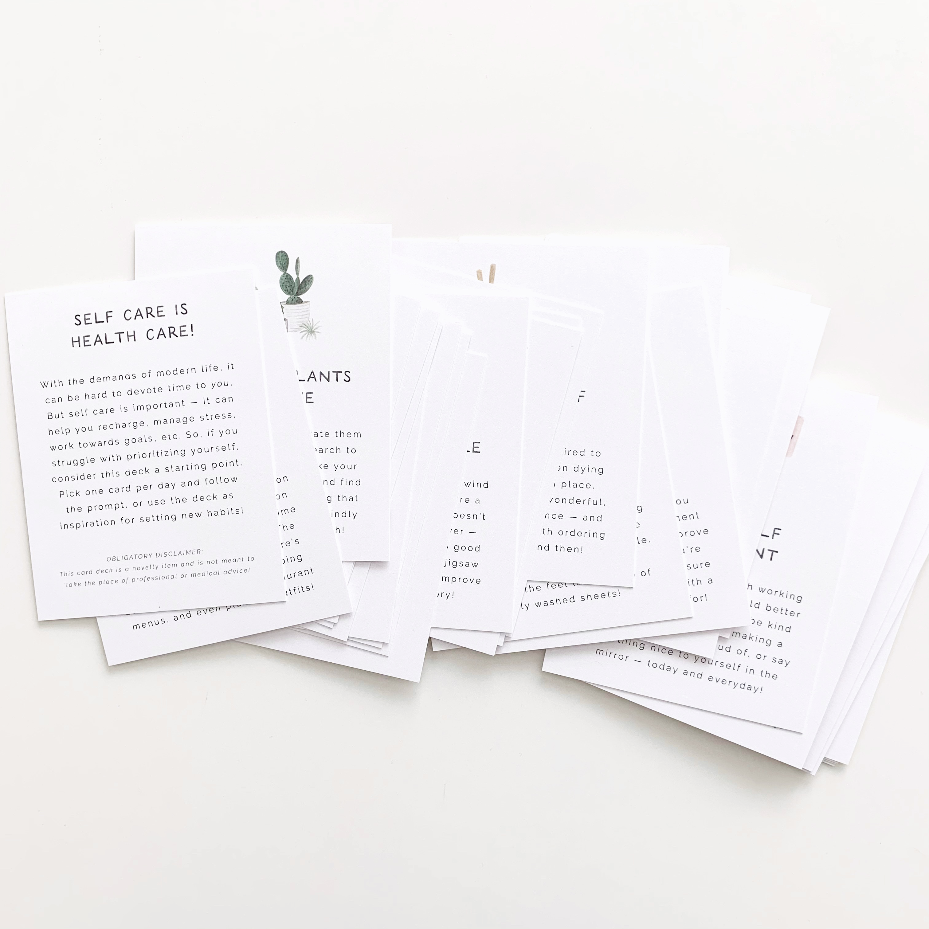 Set of printed cards with text on a white surface