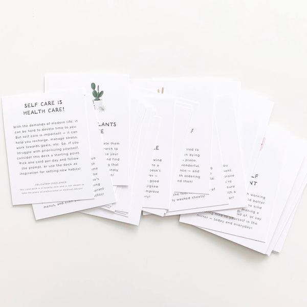 Set of printed cards with text on a white surface