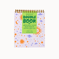 A spiral-bound Doodle Book with a light purple cover decorated with orange and blue space-themed doodles, featuring a bright green title label on the front.