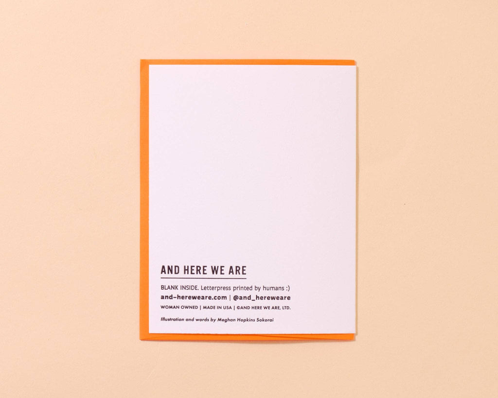 White card with text on a beige background