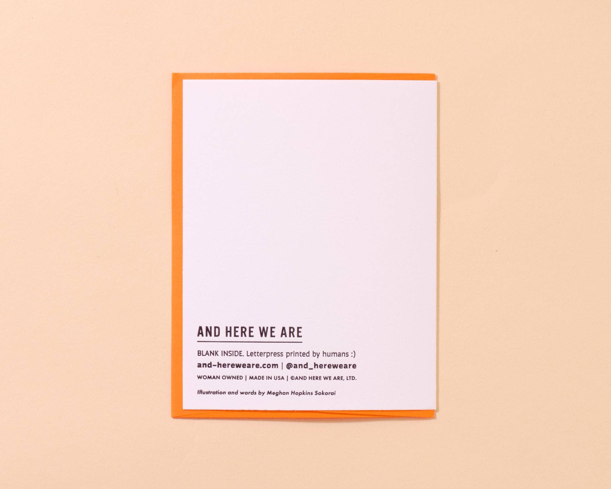 White card with text on a beige background