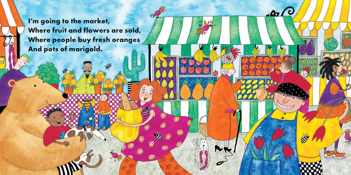 A colorful children's book illustration showing a market scene with people, fruit stalls, and a large teddy bear holding a child. The left side includes printed text: 'I'm going to the market, Where fruit and flowers are sold, Where people buy fresh oranges And pots of marigold.