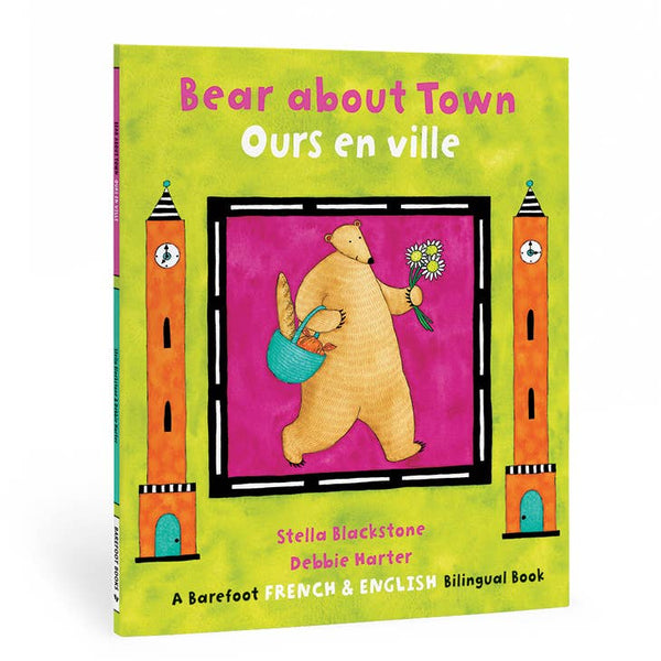 A cover of the book 'Bear about Town / Ours en ville' featuring a illustration of a cartoon bear holding a flower, with buildings in the background. The cover has text in both English and French and mentions that it is a bilingual book.