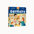 A children's hardcover book titled 'Germany' by Andrea Triplek and Andrea Liebe, featuring a colorful illustration of a bakery scene on the front cover, shown against a plain off-white background.
