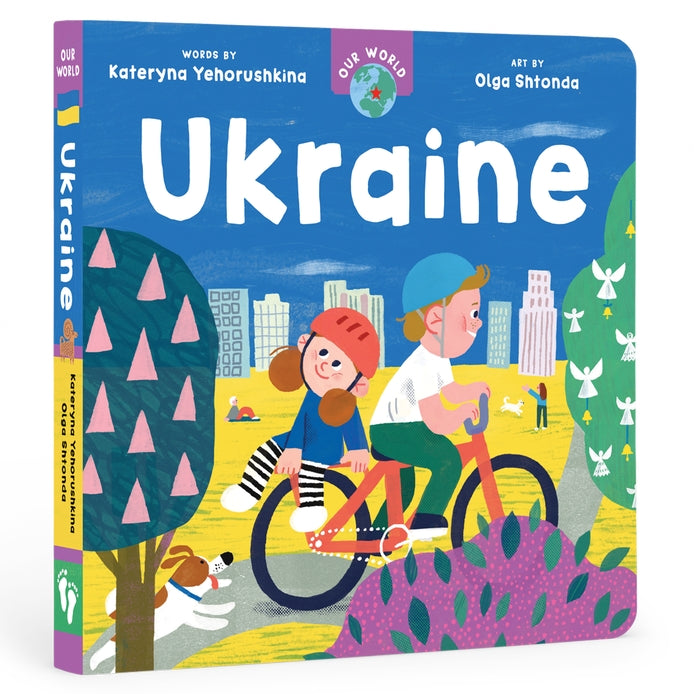 A board book cover featuring illustrations of a diverse group of people, a cityscape, and elements of Ukrainian culture such as a bicycle, a book, and a kite.
