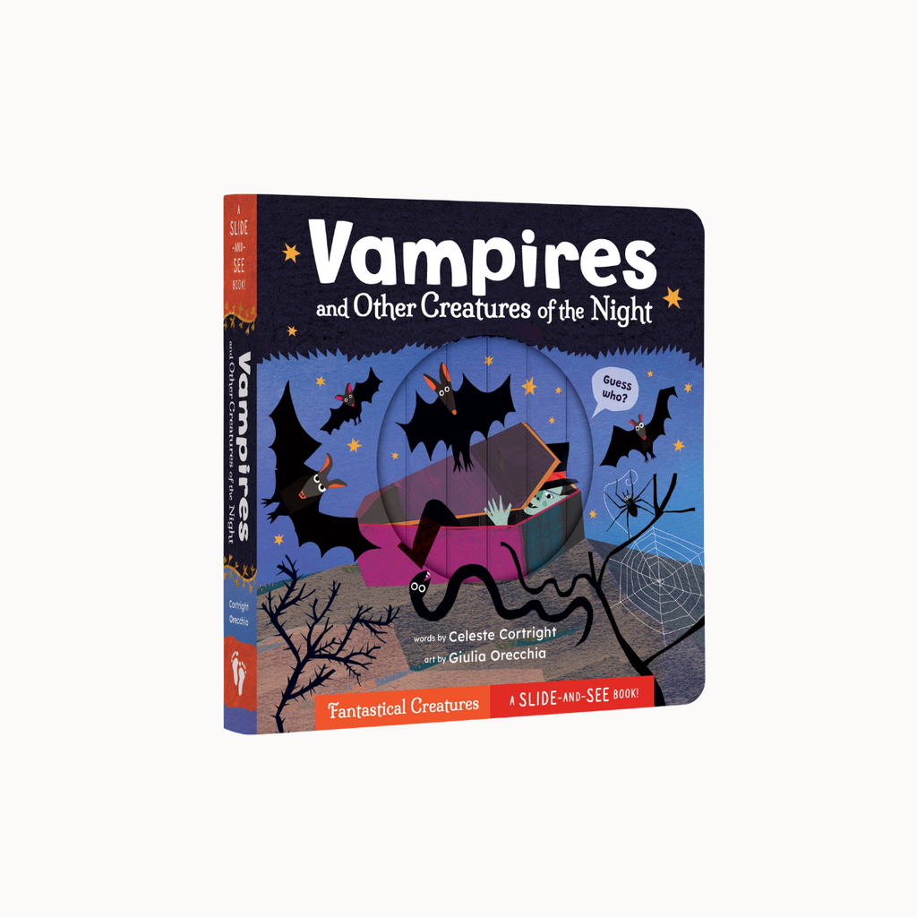 A children's board book titled "Vampires and Other Creatures of the Night" shown standing upright on a plain light background. The cover features a dark illustrated scene with bats, a coffin, spiderwebs, and a blue night sky, plus orange title text and orange bands near the bottom.