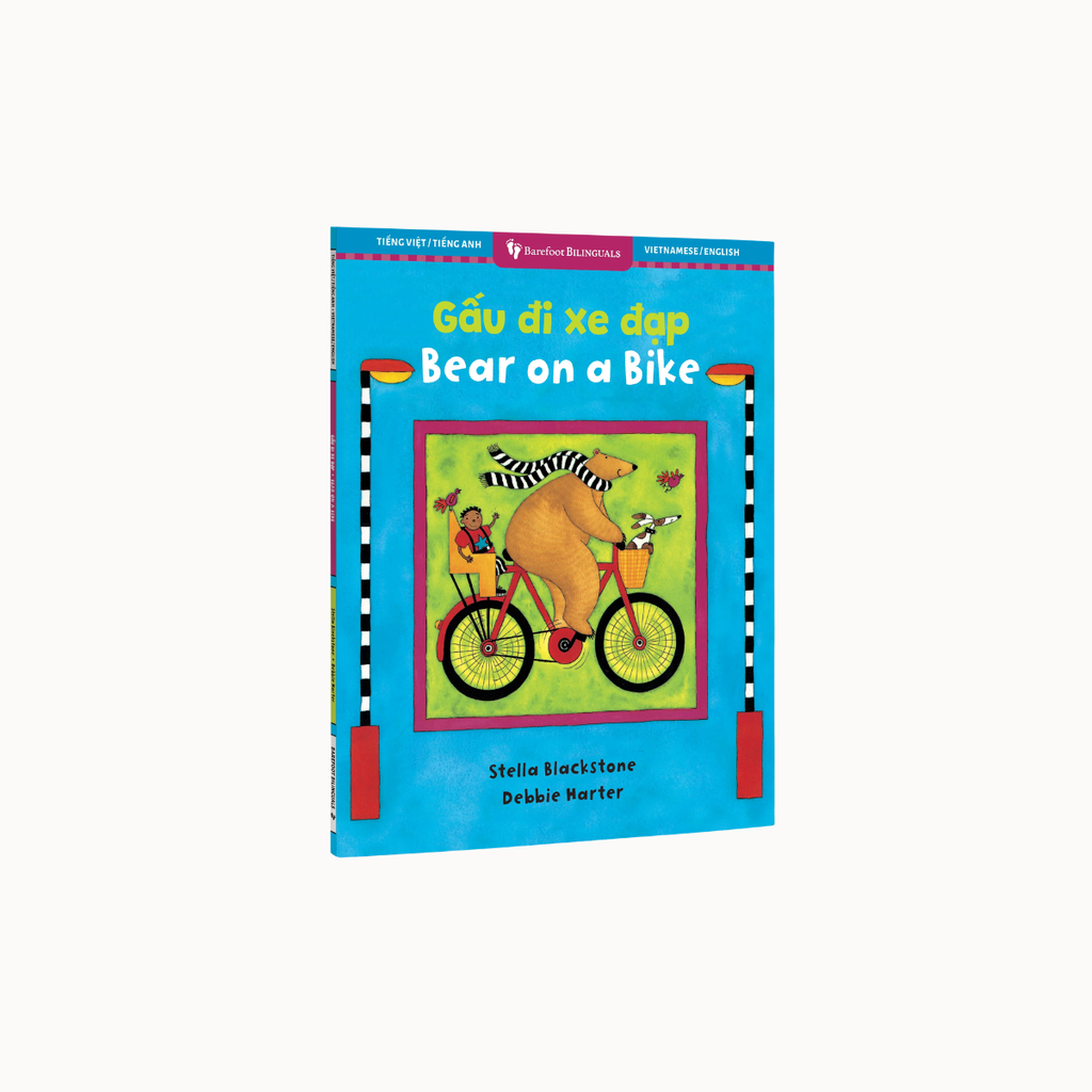 Children's book titled 'Bear on a Bike' by Stella Blackstone and Debbie Marter, featuring a bright blue cover with a central illustration of a bear riding a bicycle.