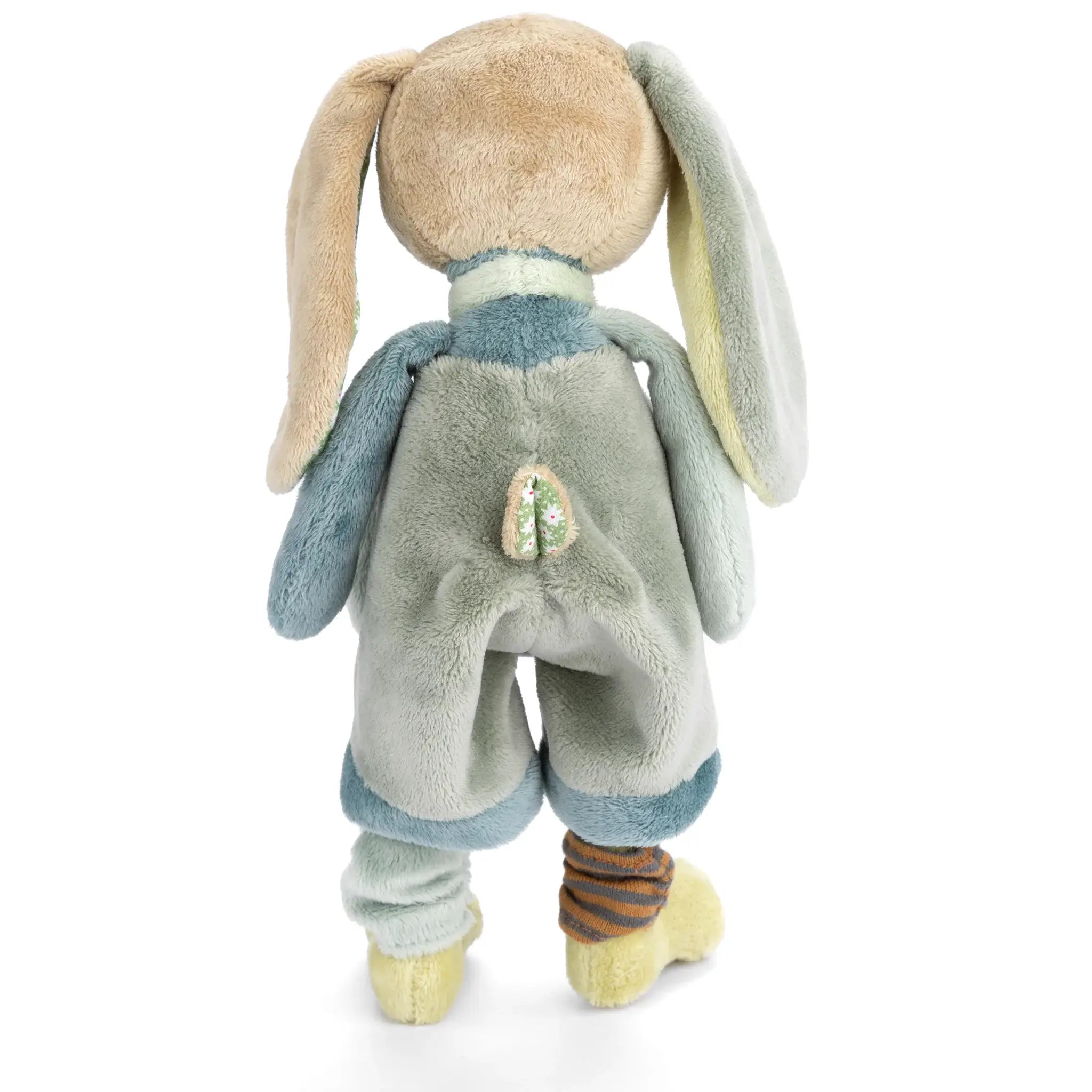 Plush toy rabbit with a heart on a white background