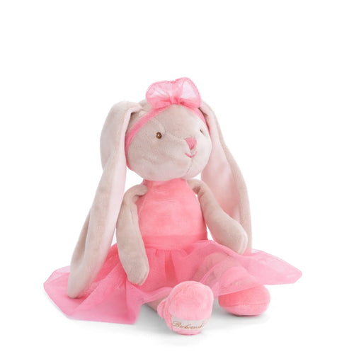 Plush rabbit toy in a pink dress with a bow on a white background