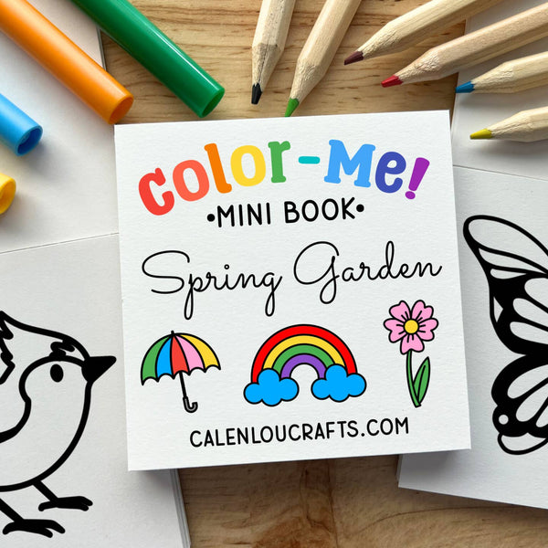 Color-Me! Mini Book for Spring Garden with coloring tools on a wooden surface