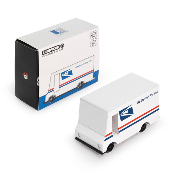 Model of a postal delivery truck with packaging on a white background