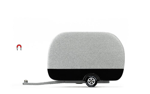 Small trailer with a gray camper shell on a white background