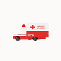 A toy ambulance model with a red and white body, black wheels, a red siren, and 'AMBULANCE LOS ANGELES' printed on the side, shown against a plain white background.