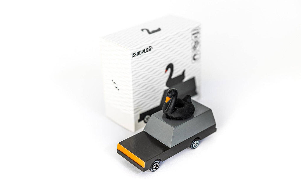 Model of a car with a swan on top, featuring the brand 'CANDYLAB' on a white background.