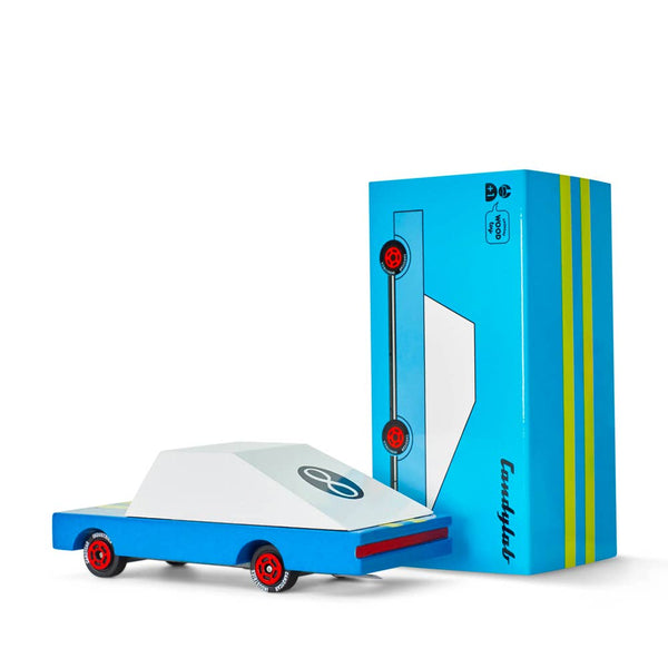 Toy car and its packaging on a white background