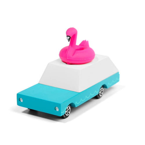Toy car with a pink flamingo on top against a white background