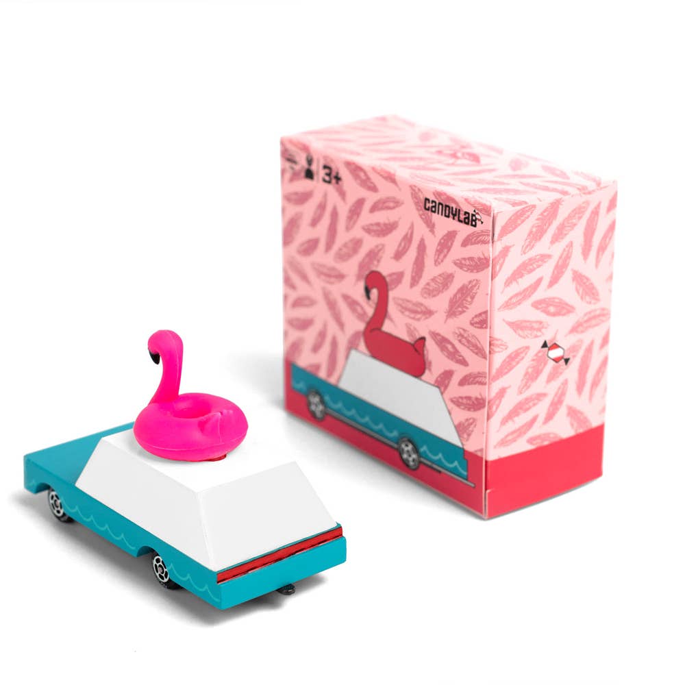 Flamingo-shaped car and box with flamingo design on a white background