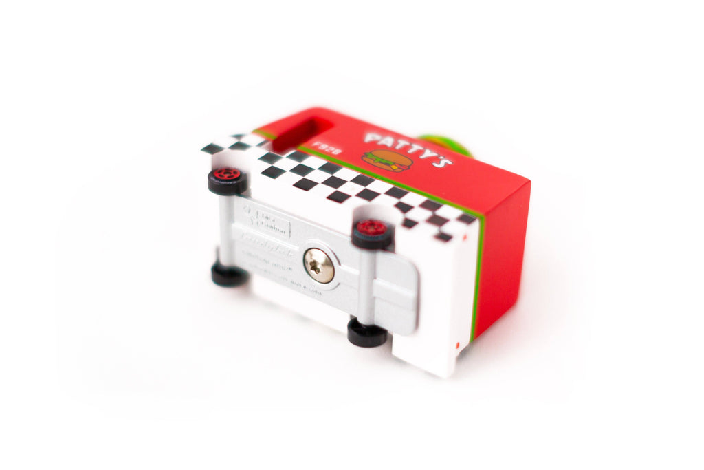 Small mechanical device with a red box featuring 'Patty 3' branding on a white background