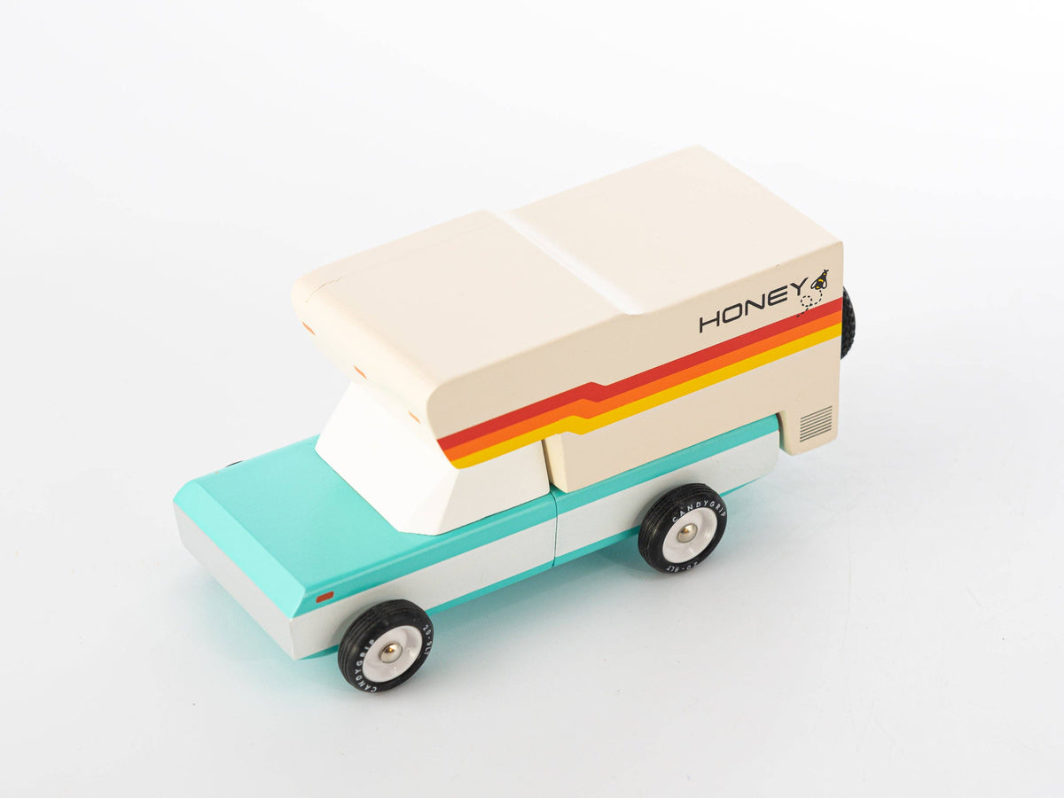 Toy truck with a colorful design on a white background