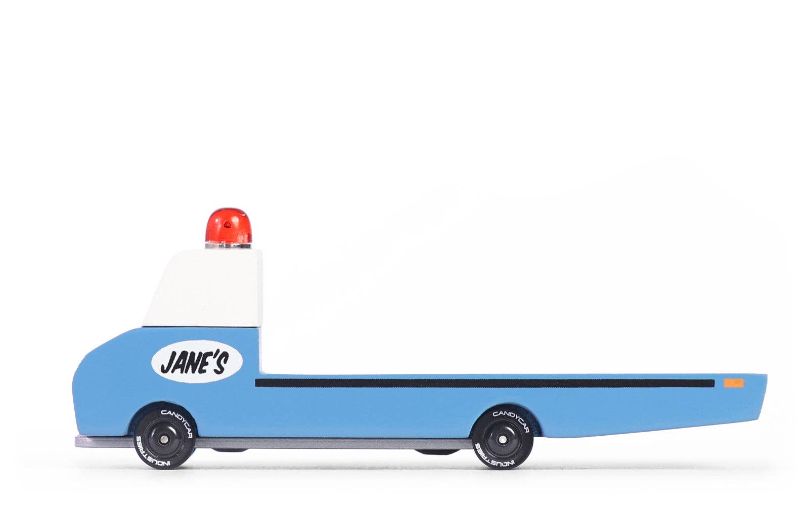 Blue toy truck with a white tank-like body and red light on top, branded 'Jane's'.