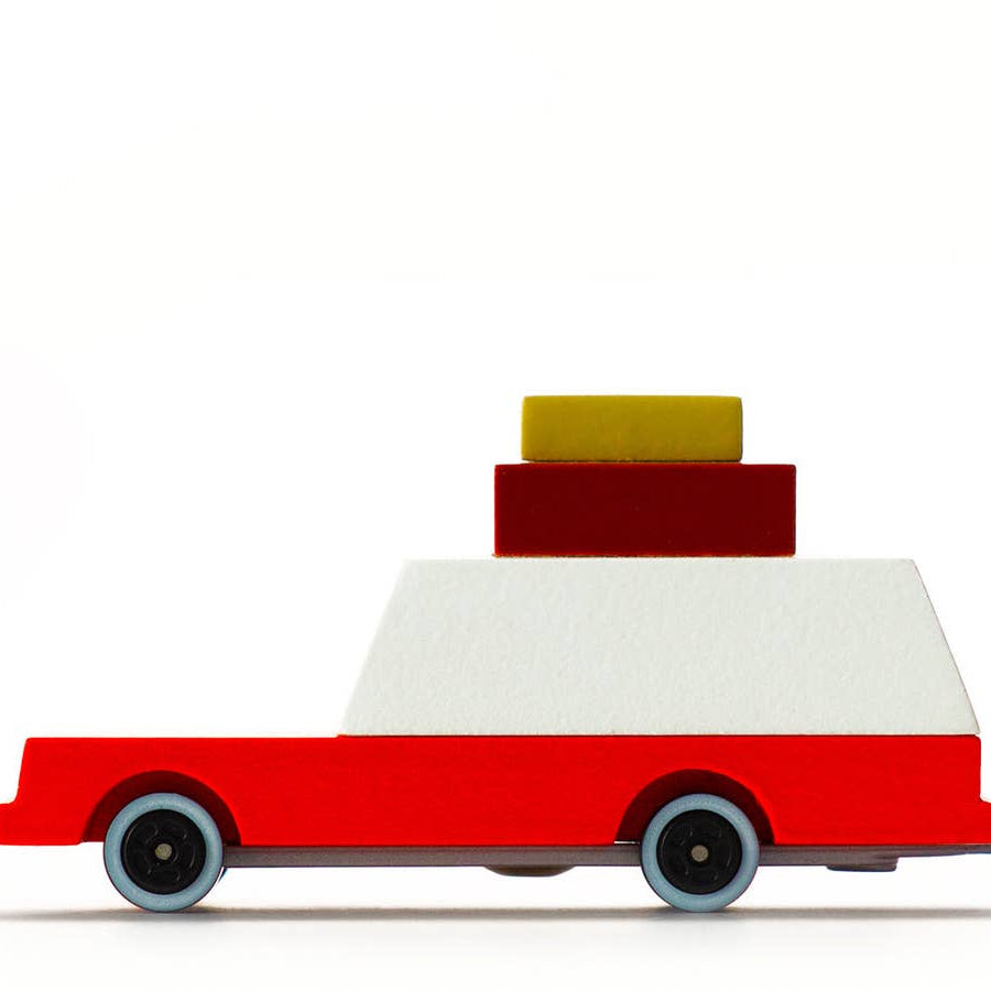 Red toy wagon car with a white roof on a white background