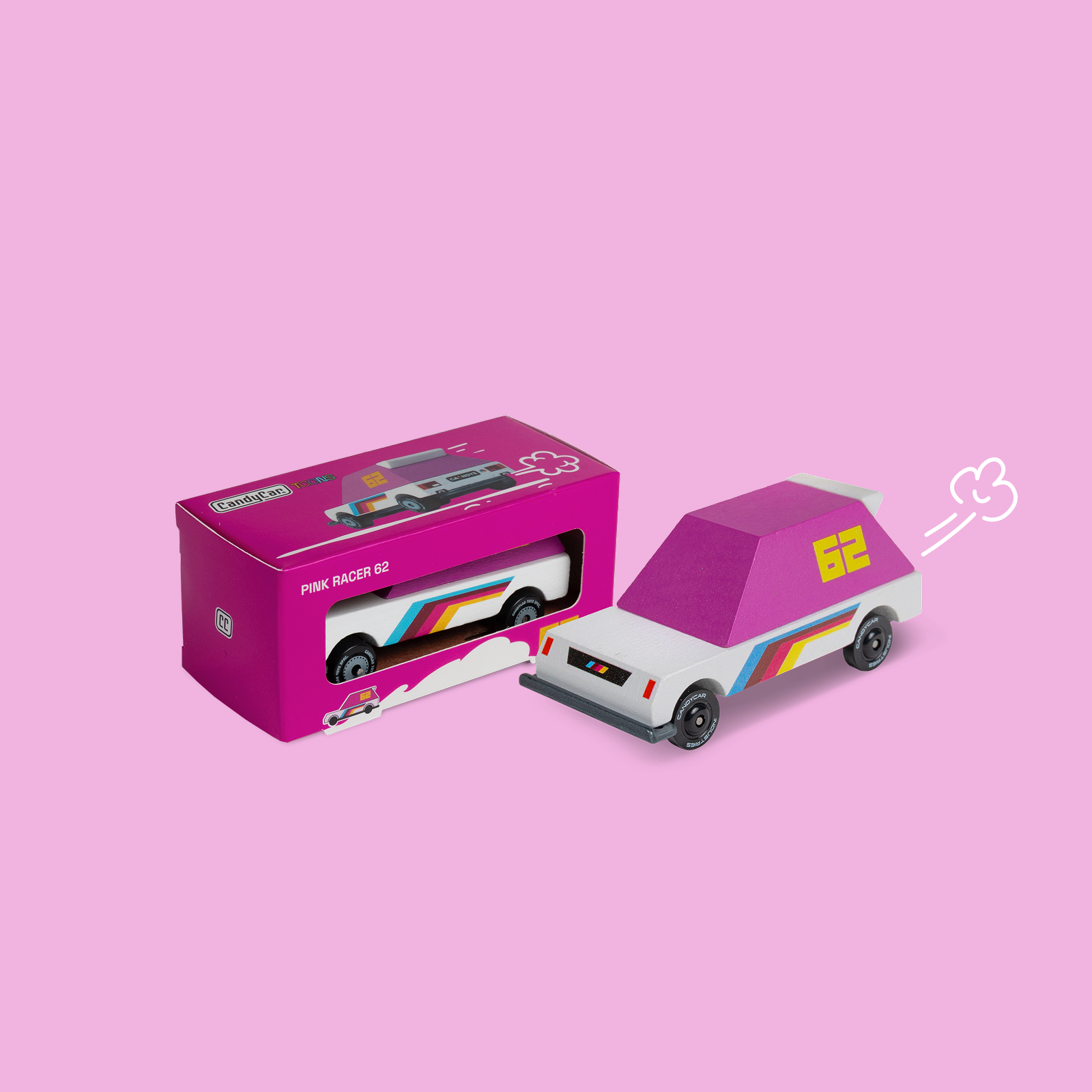 Toy car with pink roof and rainbow stripes next to its packaging on a pink background