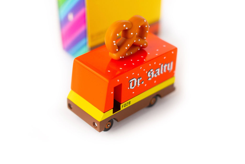 Toy pretzel themed van with pretzel on top with 'dr. salty' label on side on white background.