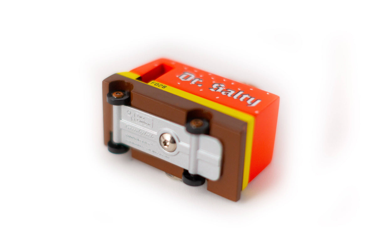 Toy pretzel themed van with 'dr. salty' label on side on white background.
