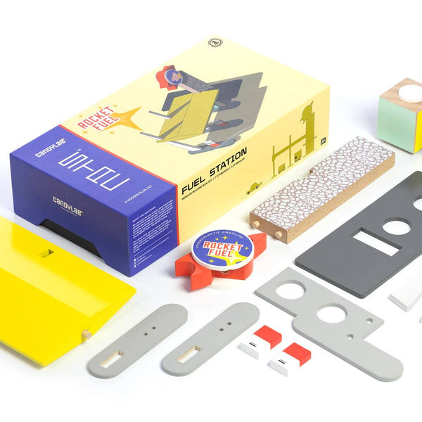 Collection of skateboard parts and packaging on a white background
