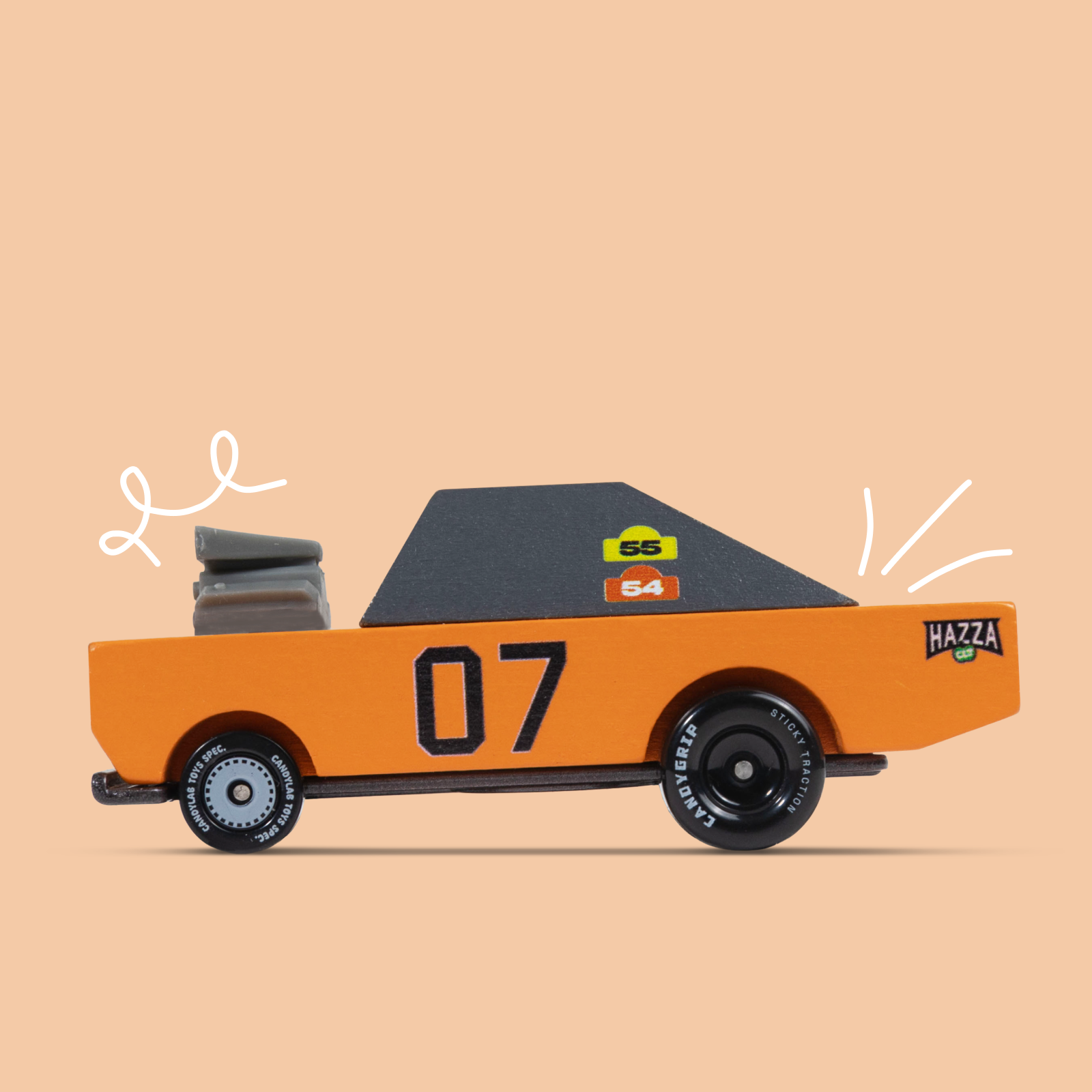 Cardboard car model with '07' and 'Hazzza' branding on a beige background