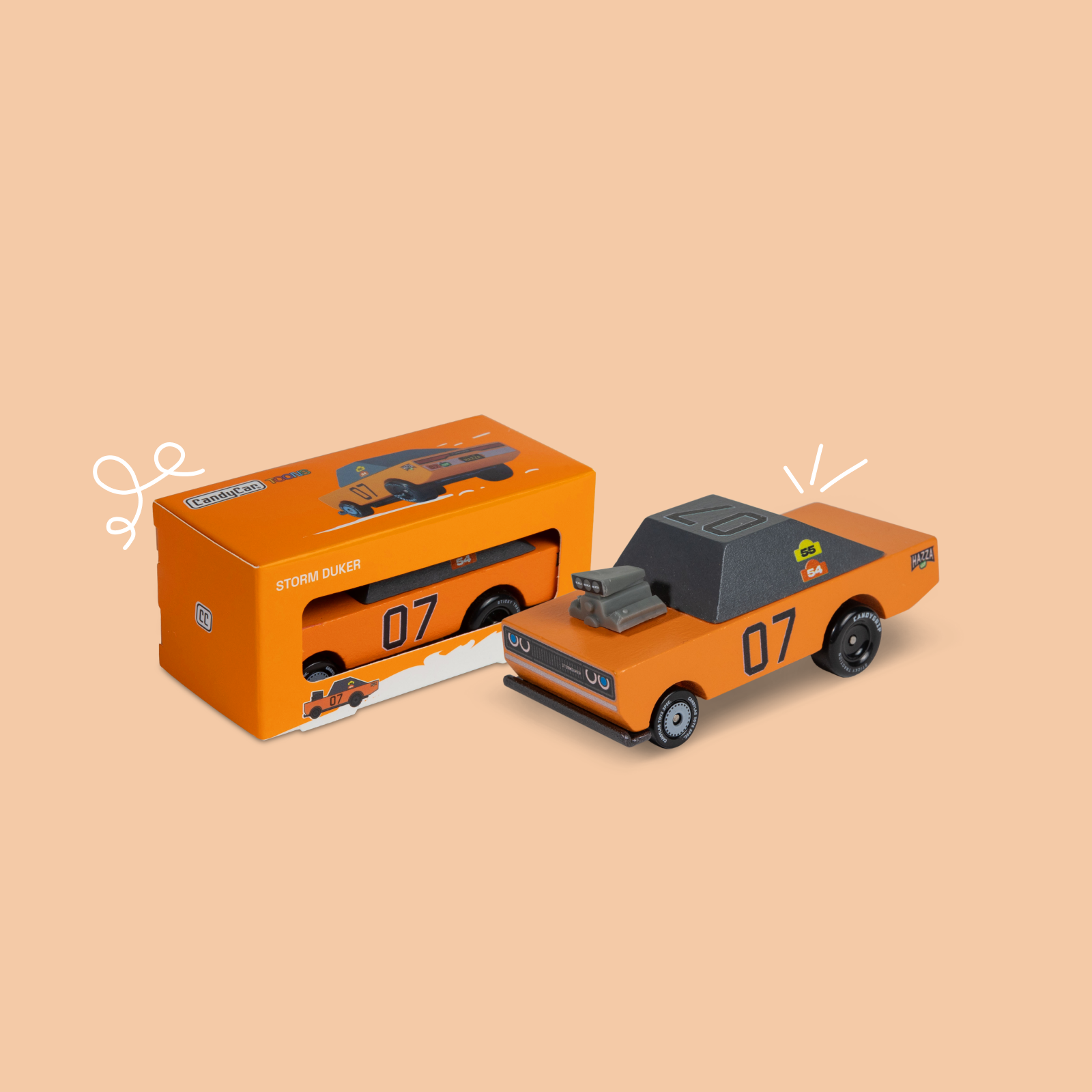 Orange toy truck with '07' and a matching box on a beige background