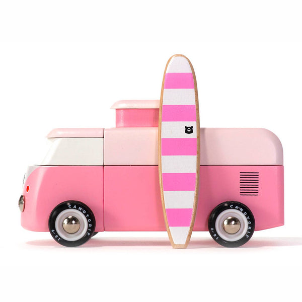 Pink toy car with a striped surfboard on a white background