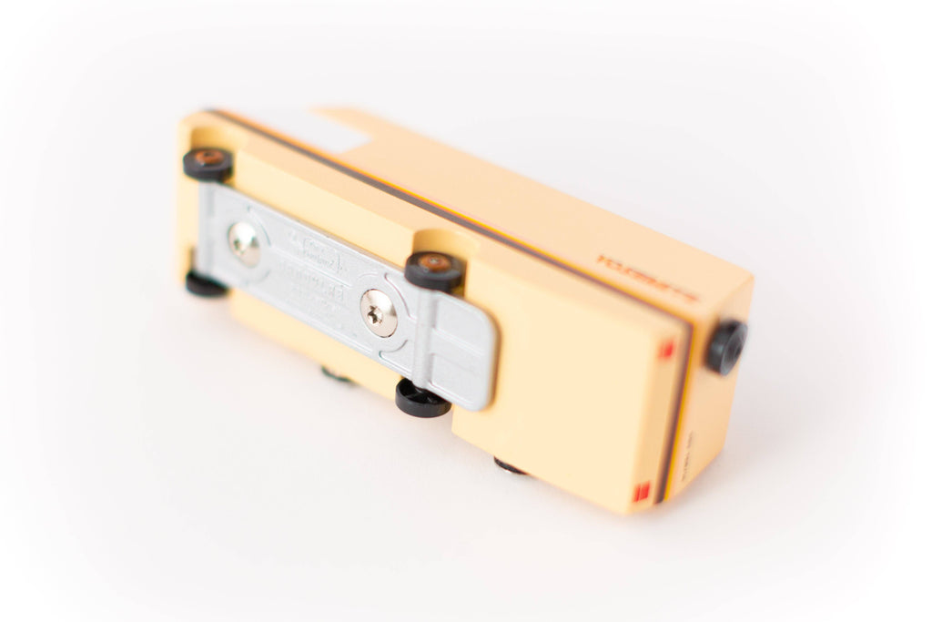 Gold and silver pencil sharpener on a white background