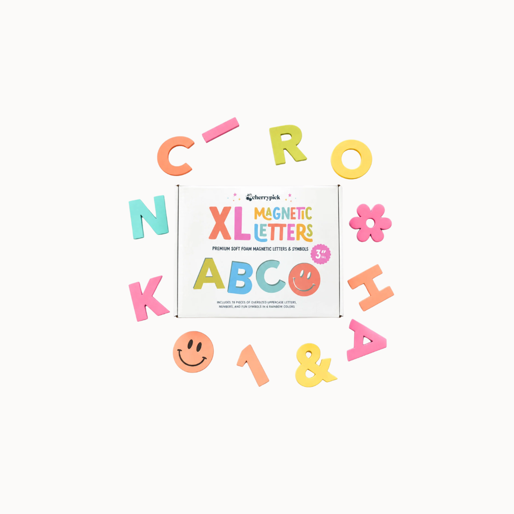 A set of colorful magnetic letters and symbols arranged around a white product box on a light gray background. The box reads 'Evershift XL Magnetic Letters' and shows assorted pastel and bright letter shapes including C, R, O, N, K, A, B, C, 1, &, H, smiley faces, and a flower.