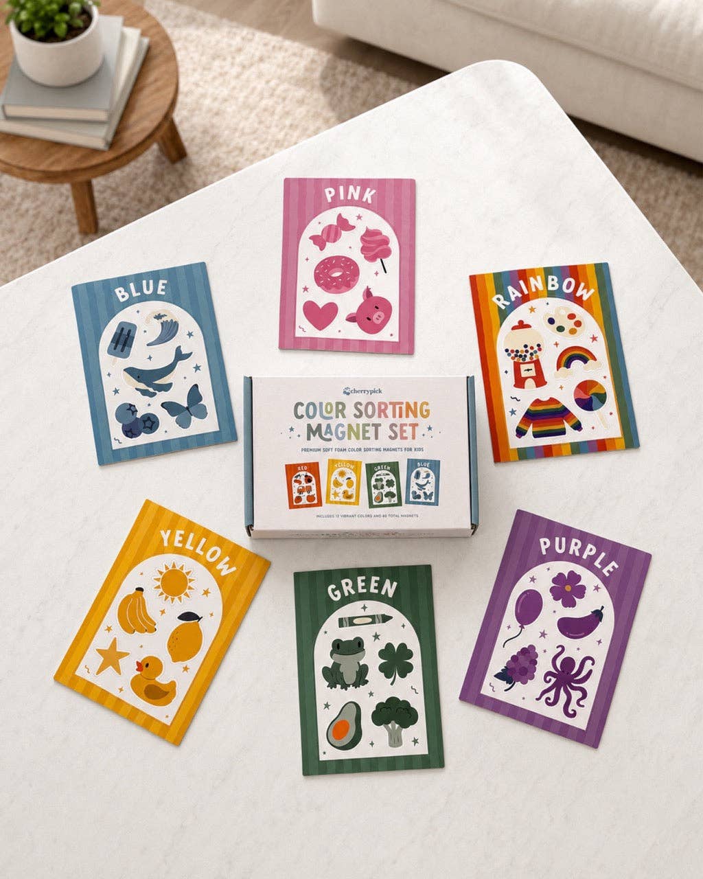 Color sorting magnet set with cards on a white surface