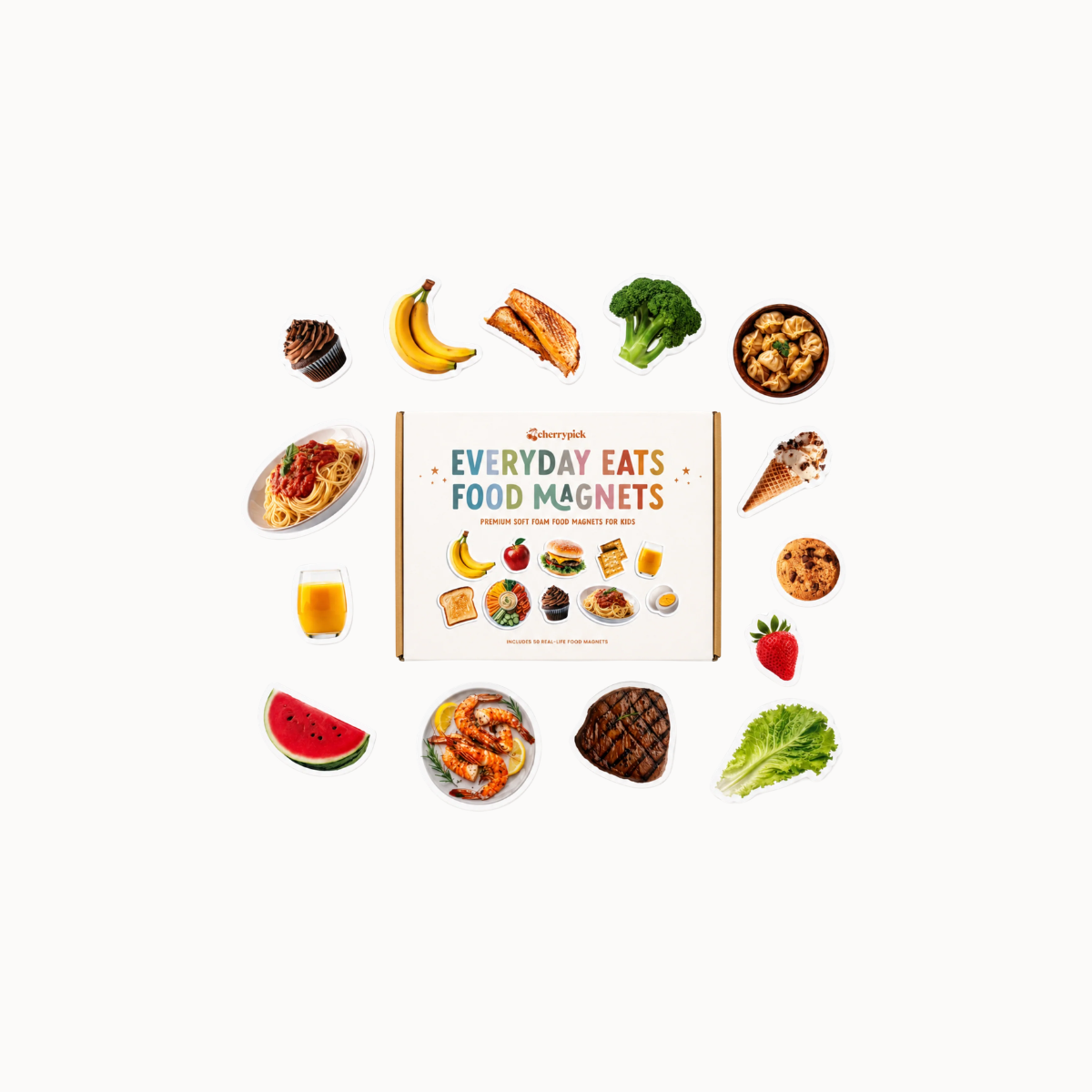 A boxed cookbook or guide titled 'Everyday Eats Food Magnets' is centered on a white background, surrounded by small food photos such as a banana, broccoli, watermelon, pasta, ice cream, steak, and fruit. No person, animal, or real environment is present, so this is Product/Packaging rather than Lifestyle.