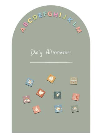 Decorative board with colorful letters above a daily affirmation space and small decorative stickers below.