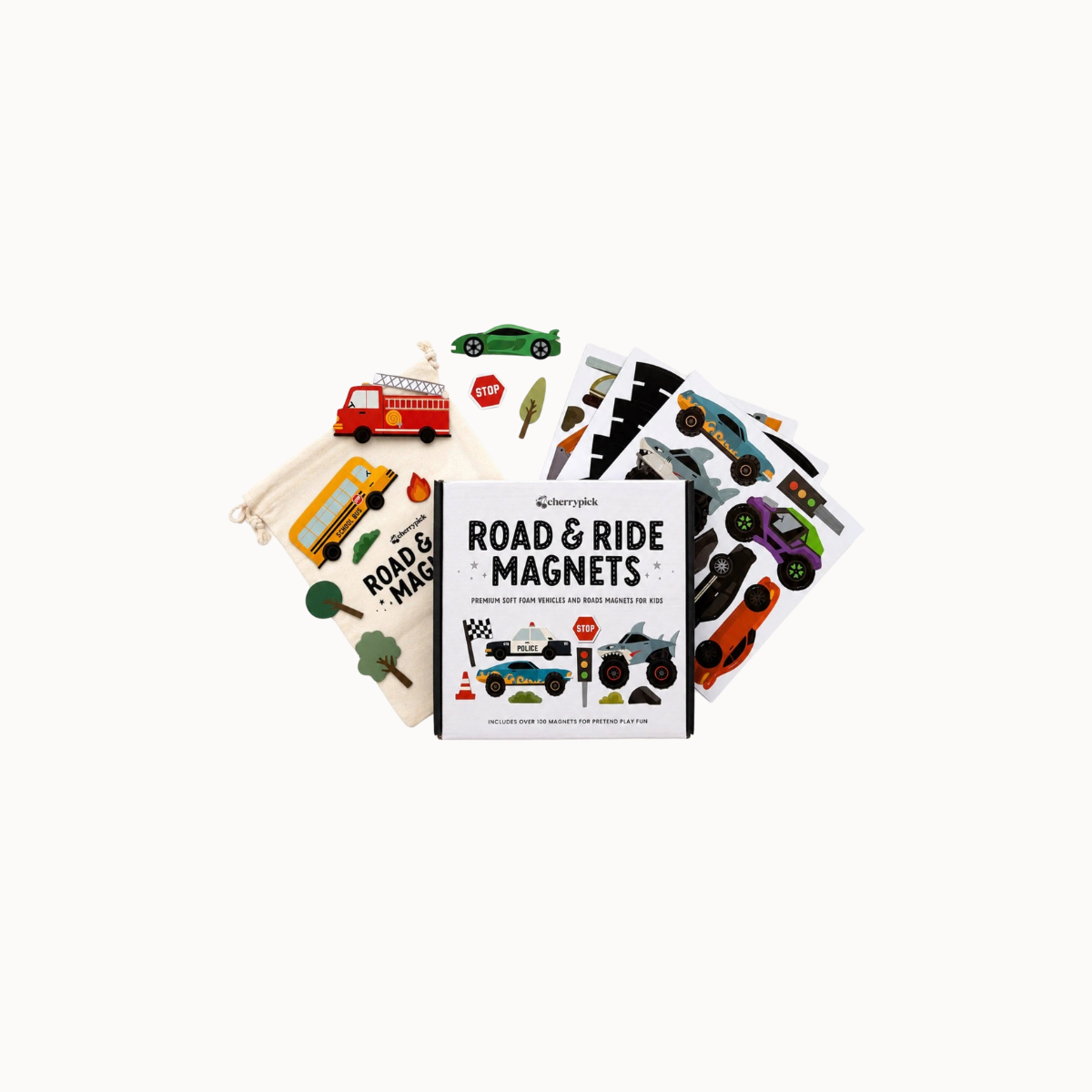 A children's road and ride magnets set displayed on a clean white background. The set includes a white drawstring bag, a small book titled 'ROAD & RIDE MAGNETS', and several sheets of colorful vehicle-shaped magnets such as cars, trucks, buses, and traffic signs.