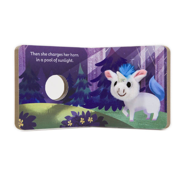 Children's book page with a unicorn illustration and text on a purple background
