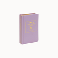 A lavender purple hardcover journal styled like a small book, featuring gold foil lettering that reads 'MOM'S ONE LINE A DAY' and 'LIFE IS SHORT - MEMORY BOOK' on the front cover, set against a plain white background.