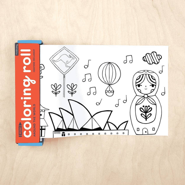 Coloring roll book with world landmarks on a wooden surface