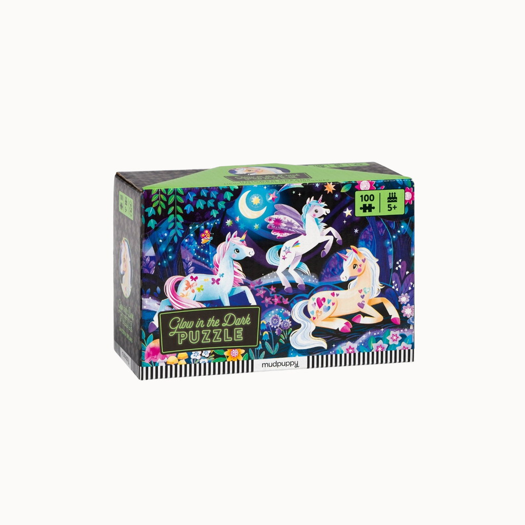 A 100-piece jigsaw puzzle box by Modus Operandi featuring a magical night scene with two unicorns under a crescent moon.