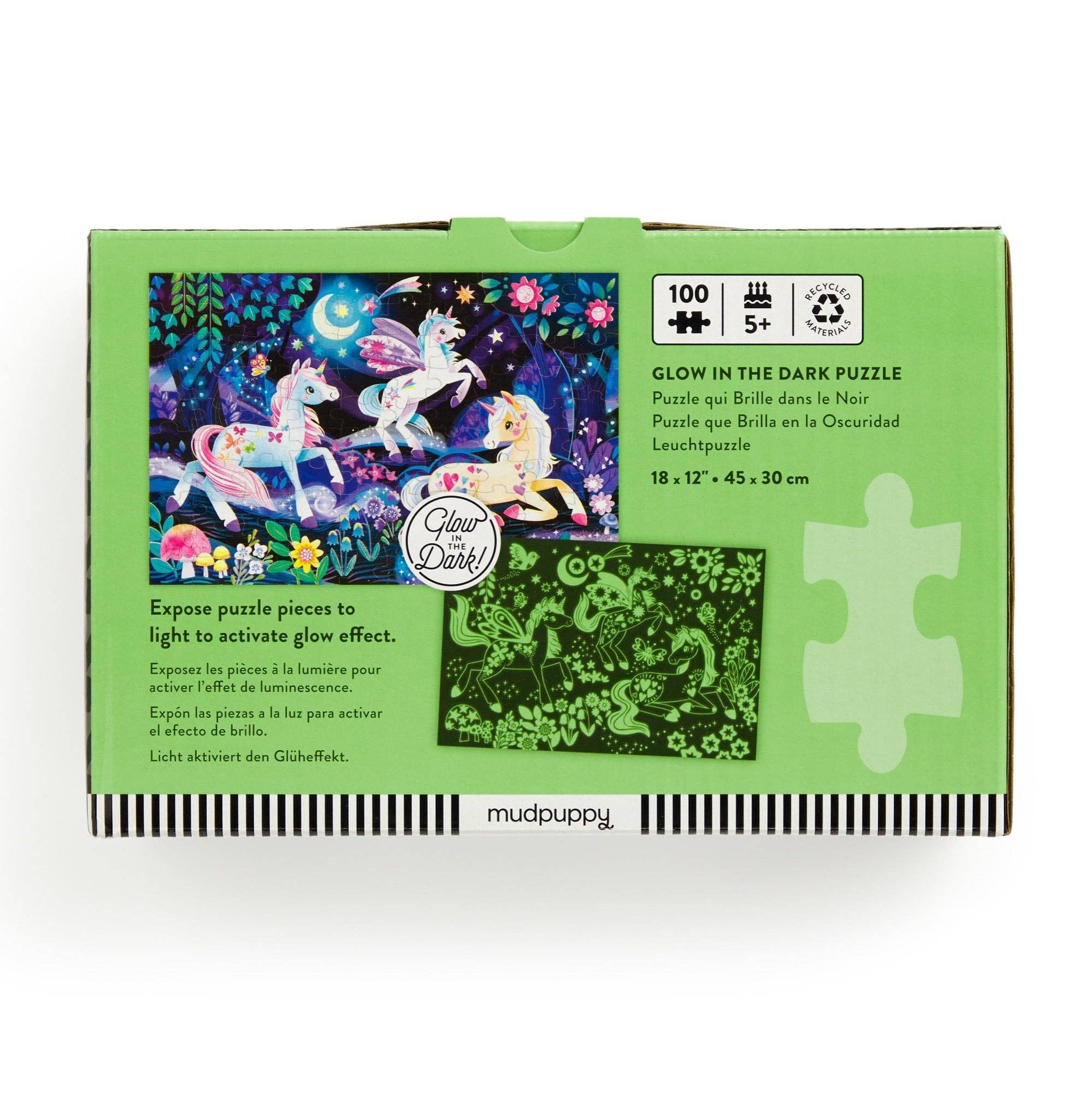 Glow in the dark puzzle packaging with unicorn design on a white background