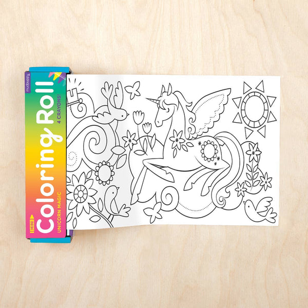 Coloring roll with unicorn design on a wooden surface