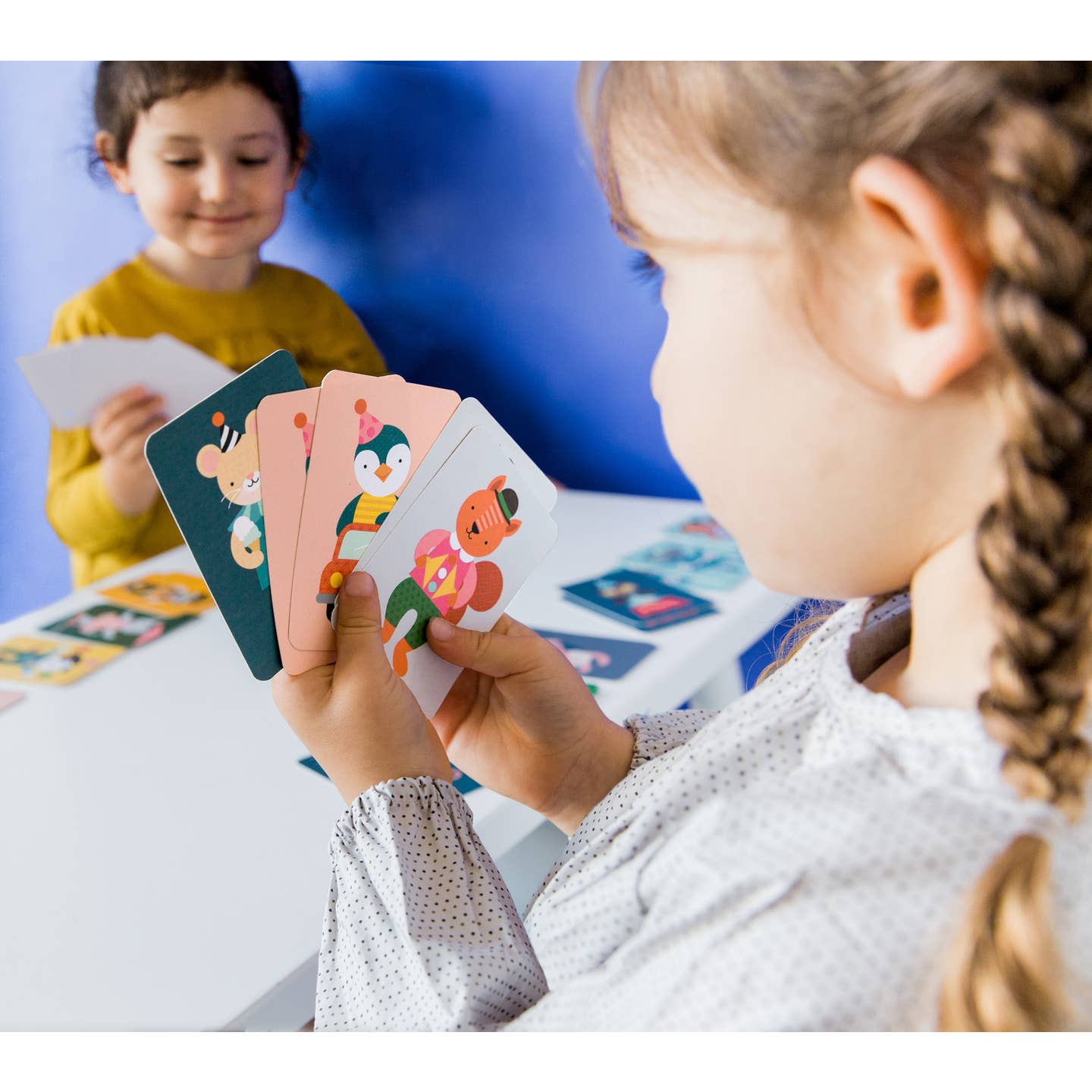 kids playing a card game