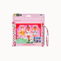 A pink retail package for a Petit Toys 'Two Sided On-the-Go Puzzle ballerinas' set, containing two mini puzzles in a zippered pouch with a wrist strap, shown against a plain white background.