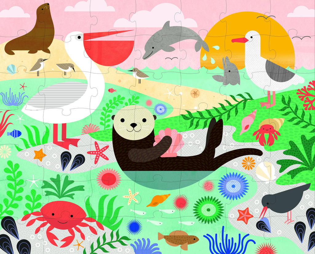 Colorful children's puzzle with sea animals on a pink and green background