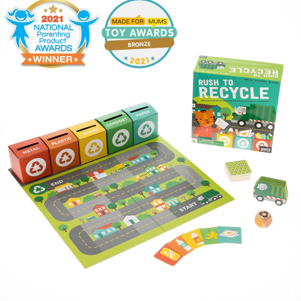 Children's recycling-themed board game with colorful components and awards on a white background